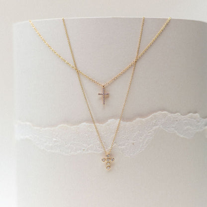 CROSS. DIAMONDS MOUNTED IN 14K YELLOW GOLD