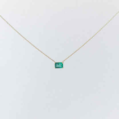 SOLITAIRE PENDANT: EMERALD MOUNTED IN 14K YELLOW GOLD