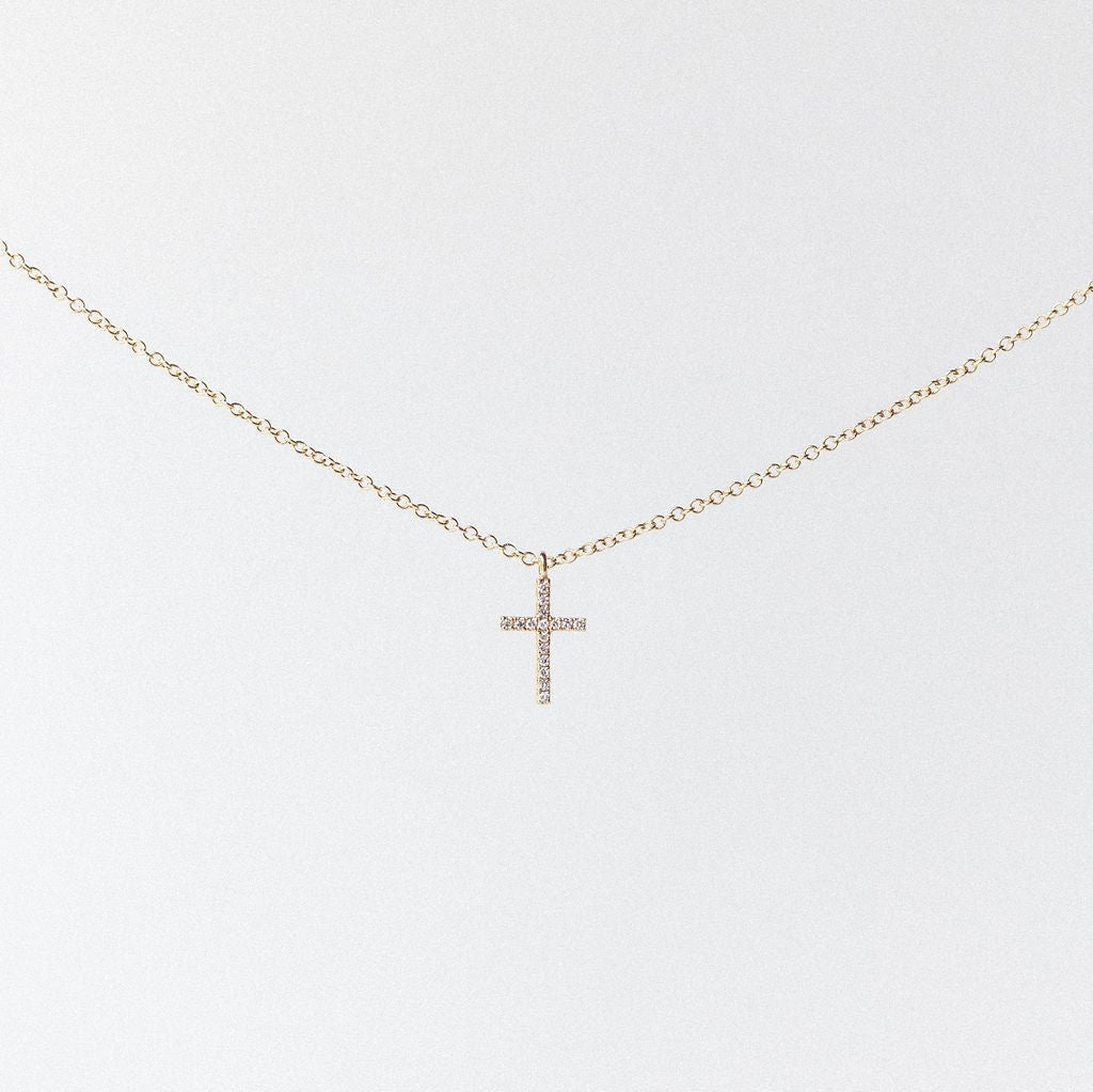 CROSS. DIAMONDS MOUNTED IN 14K YELLOW GOLD