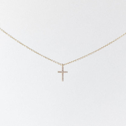 CROSS. DIAMONDS MOUNTED IN 14K YELLOW GOLD