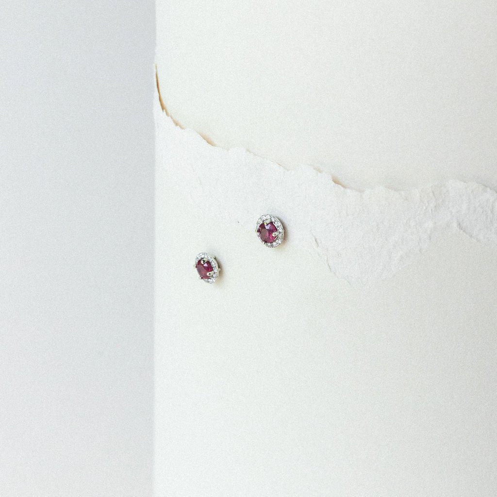 RUBY EARRINGS WITH DIAMOND HALO MOUNTED IN 14K WHITE GOLD