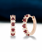 Aurora earrings with ruby ​​and white gold